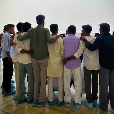 a group of people with their backs turned