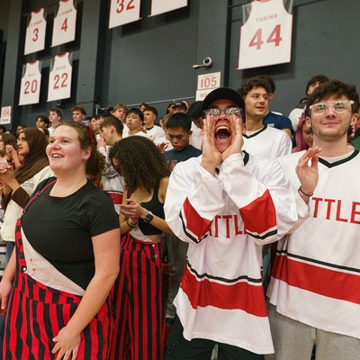Picture of students at a basketball game for Homecoming