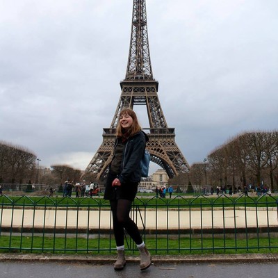 girl in front of eifel tower