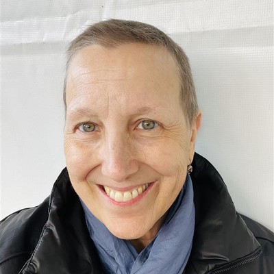 a woman in front of a white background