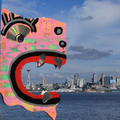Seattle city skyline framed by art sculpture
