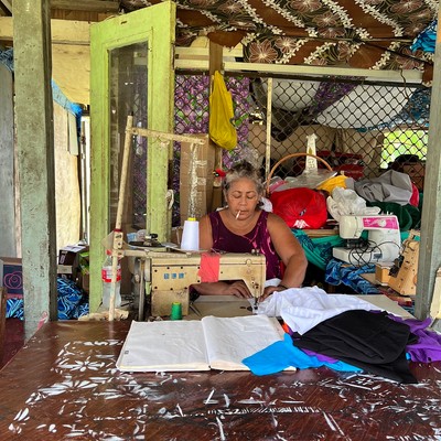 Photo of woman sewing