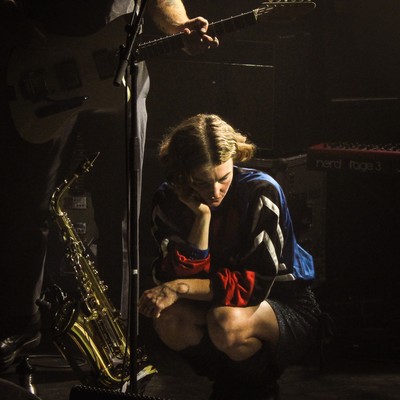 a musician waiting on stage