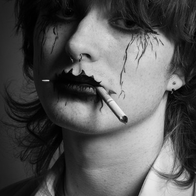 a man smoking a cigarette