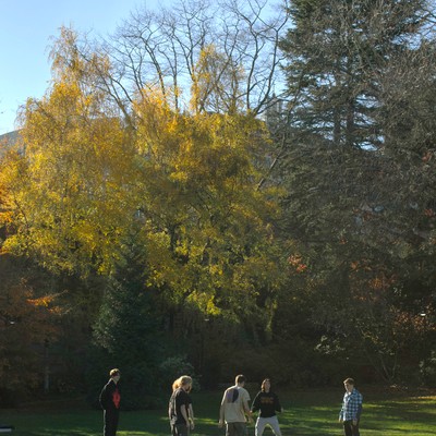 Students playing soccer on the Campus Green