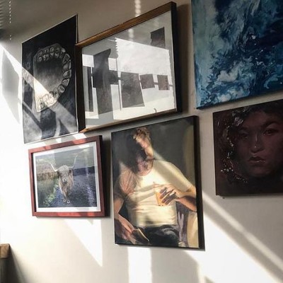 Photo of images on gallery wall