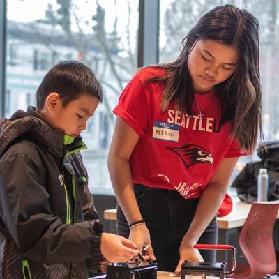Student helping a child