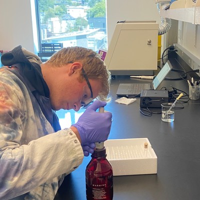 Student using a micropipette