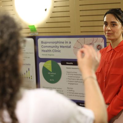 Psychiatric Mental Health DNP Student Presenting Poster