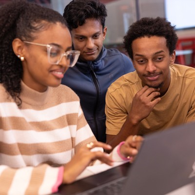Graduate Computer Science Students Working in a Small Group