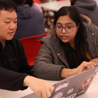 Graduate  students in the College of Science and Engineering working together in class.