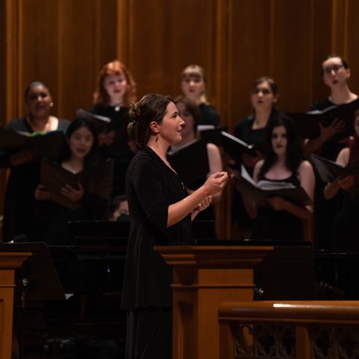 Dr. Leann Conley-Holcom conducts the choir