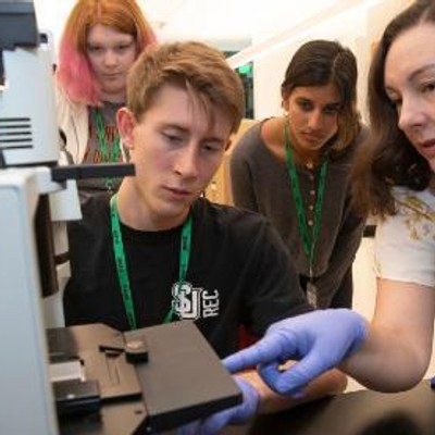 Seattle U Sinegal Center with Students and Professor