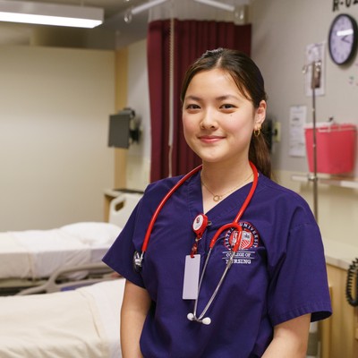 A Nursing Student Standing in the Clinical Performance Lab
