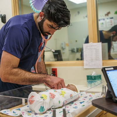 College of Nursing Student Completing a Midwifery Demonstration at the Clinical Performance Lab