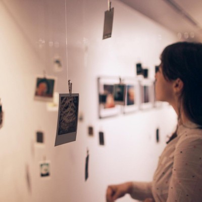 A person viewing an art gallery