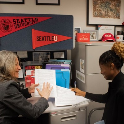 Career Center staff member meeting with a student
