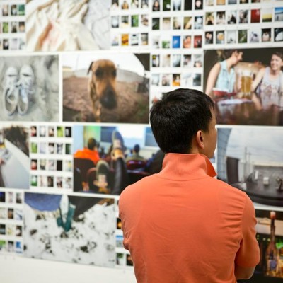 A person viewing an art gallery