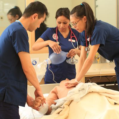 Students doing an acute care simulation at the Clinical Performance Lab