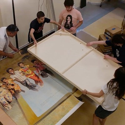 students assembling frames for art project