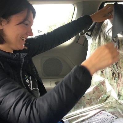 Kaiti Lopez reading a map