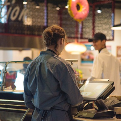 Foods service workers at Cherry Street Market in the Seattle University Student Center