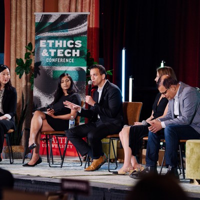panelists on stage at the 2024 Ethics and Technology Conference
