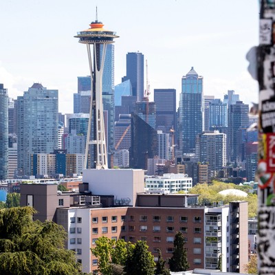 A city skyline with a tall tower.