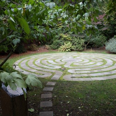 A labyrinth in the middle of a garden.