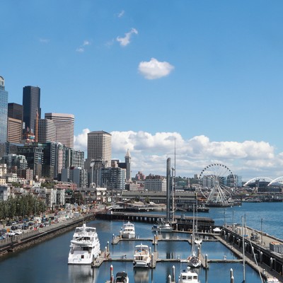 A city with boats in water.