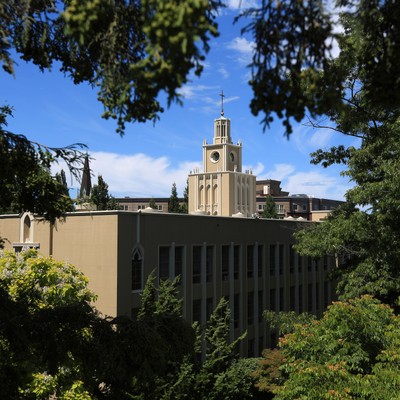 Summer photo of campus and admin building