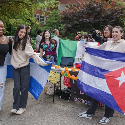 A group of people holding flags.