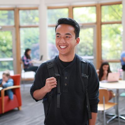 Student standing in classroom