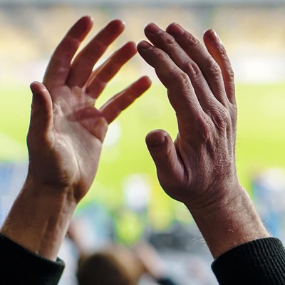 Hands clapping together