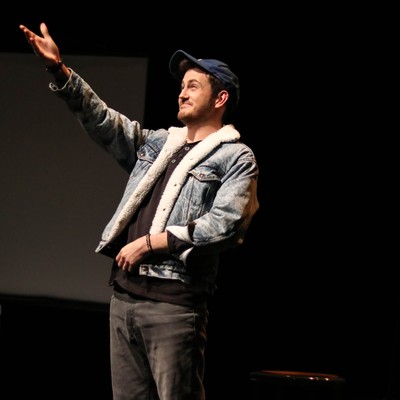 Student performing onstage