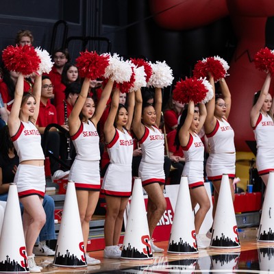Cheerleaders with pom poms
