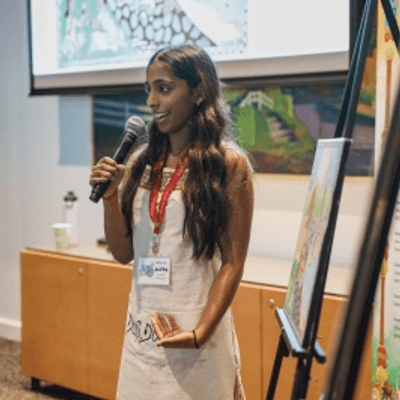 Photo of student at undergraduate research conference