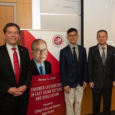 Chin-Hao Huang with Dean David Powers and Professor Yitan Lee with photo of Peter Lee