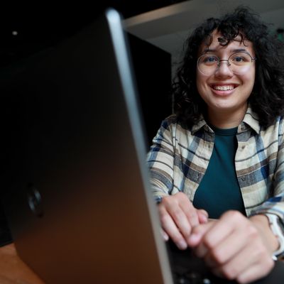 Seattle University Student Typing on a Laptop