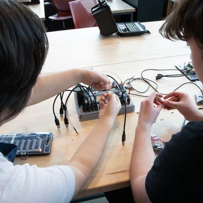 Students working with electrical equipment
