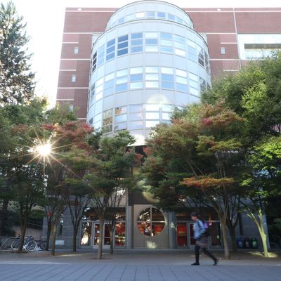 A building with trees in front of it.