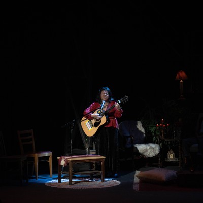 Student playing guitar
