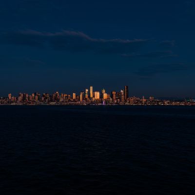 the city of seattle at night from across the water