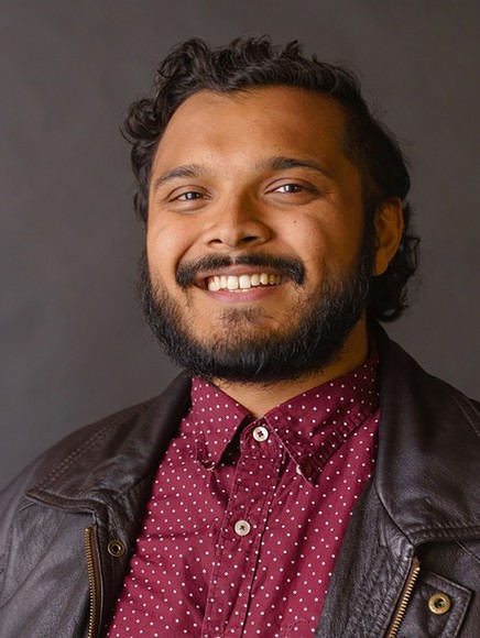 Isaiah Khan smiling headshot
