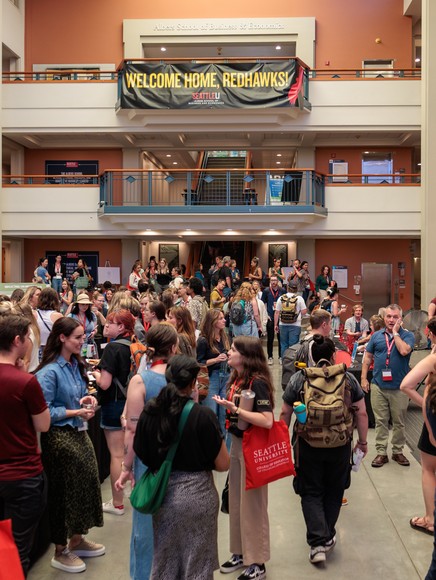 Counseling students gather in a foyer