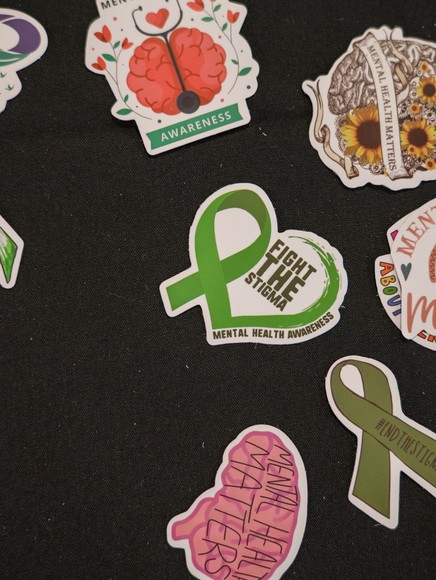 A variety of stickers promoting mental health awareness