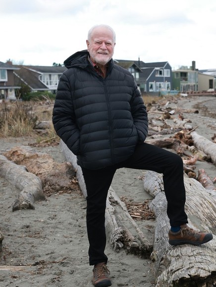 Robb Petersen standing on a beach