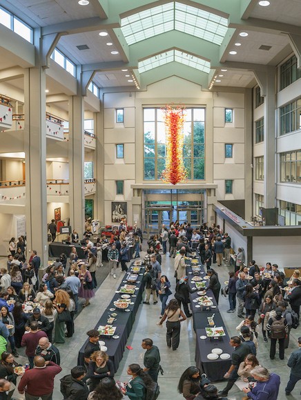 People mingling at the Mentor Fair in the Pigott Atrium