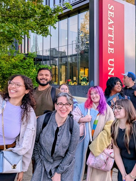MFA Students Smiling at Camera