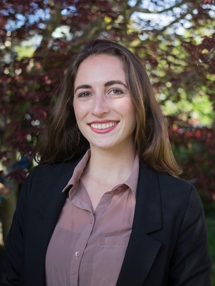 Photo of Megan Grosse in front of trees